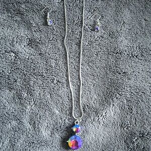 Purple and Silver multifaceted glass necklace with earrings.